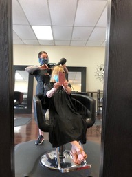 Photograph of Betsy, Owner of the Fringe Salon in Corpus Christi, doing  Lori K. Atkins' hair on May 15, 2020.